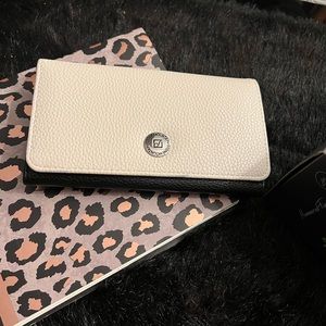 Beautiful black/ cream stone Mountain wallet still brand new never used it.